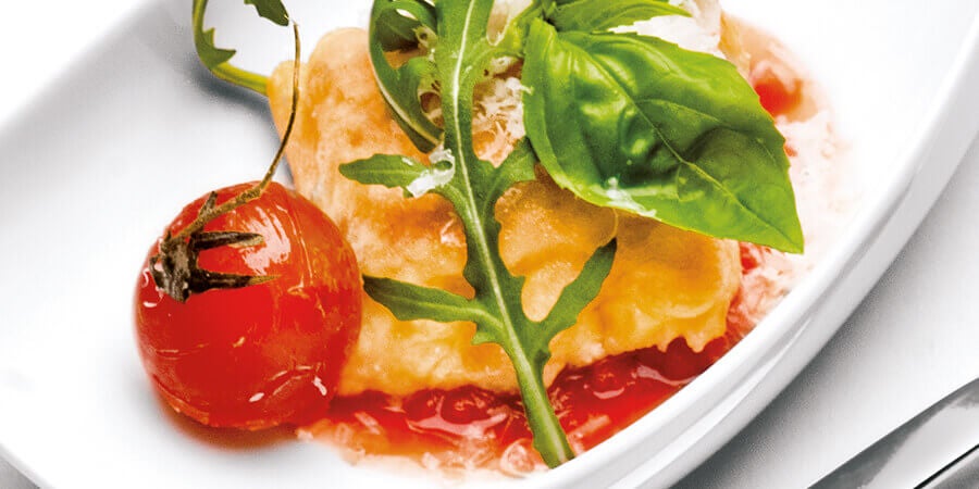 recipes-salmon-with-tomato-on-white-plate-hero-tablet-large